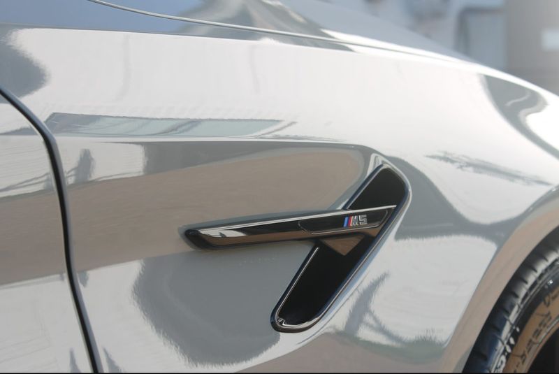 BMW M5 Competition — Exterior Detail — Fender Badge Close-Up